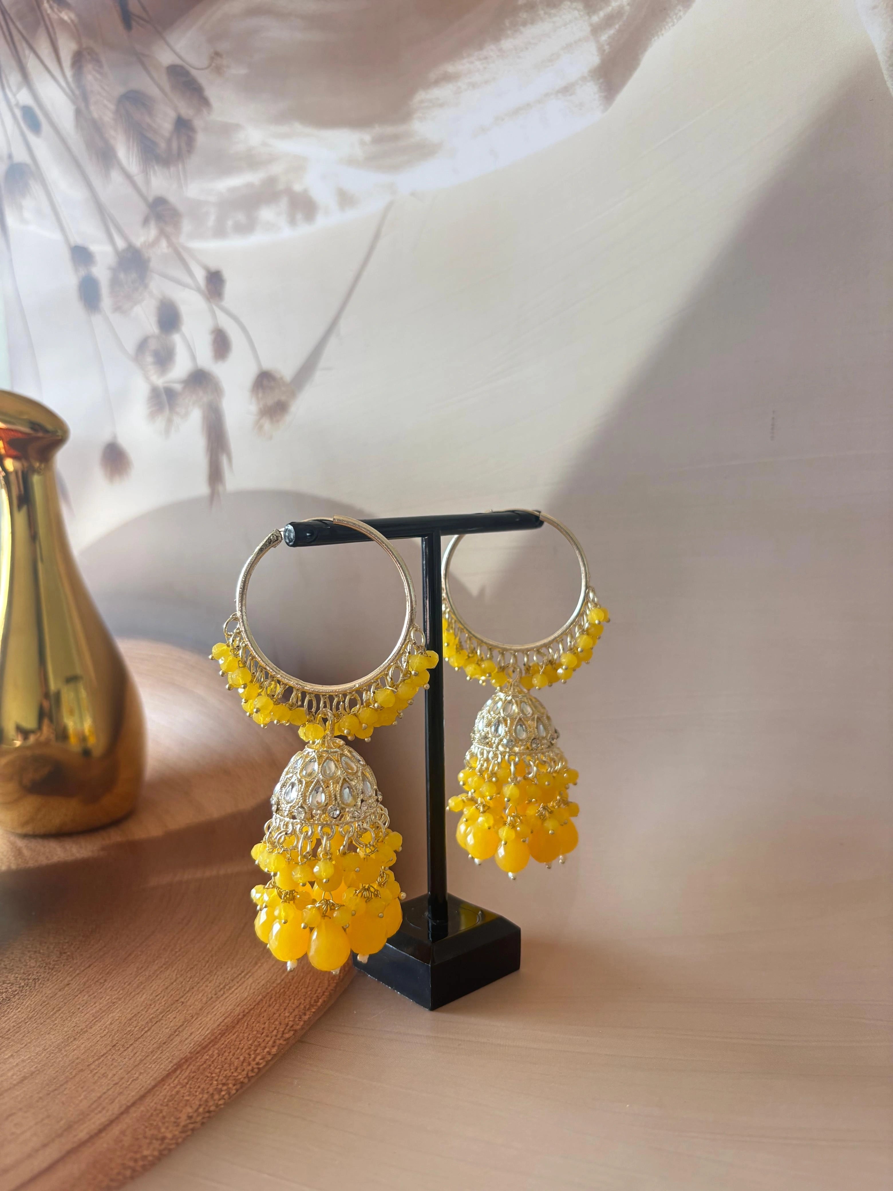 YELLOW KUNDAN STUDDED JHUMKA SET