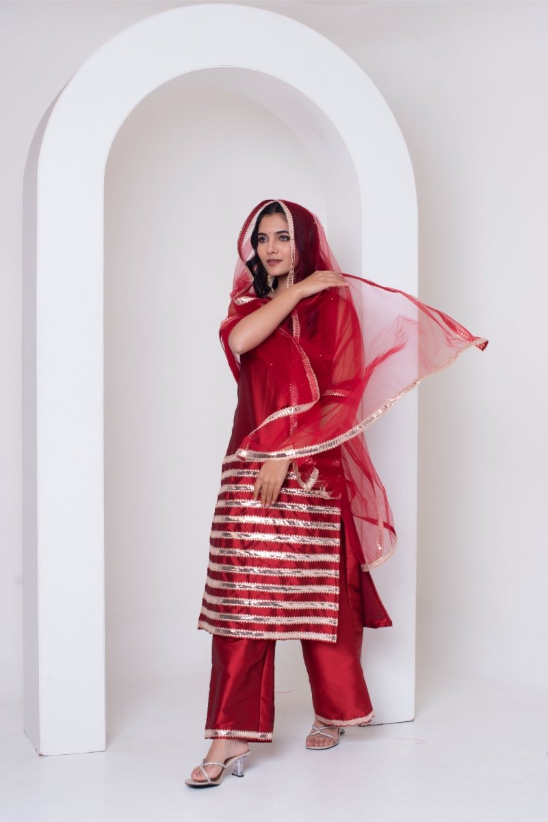 GHAZAL RED TAFFETA SILK GOTA PATTI SUIT SET WITH SOFT NET DUPATTA - Pomcha Jaipur