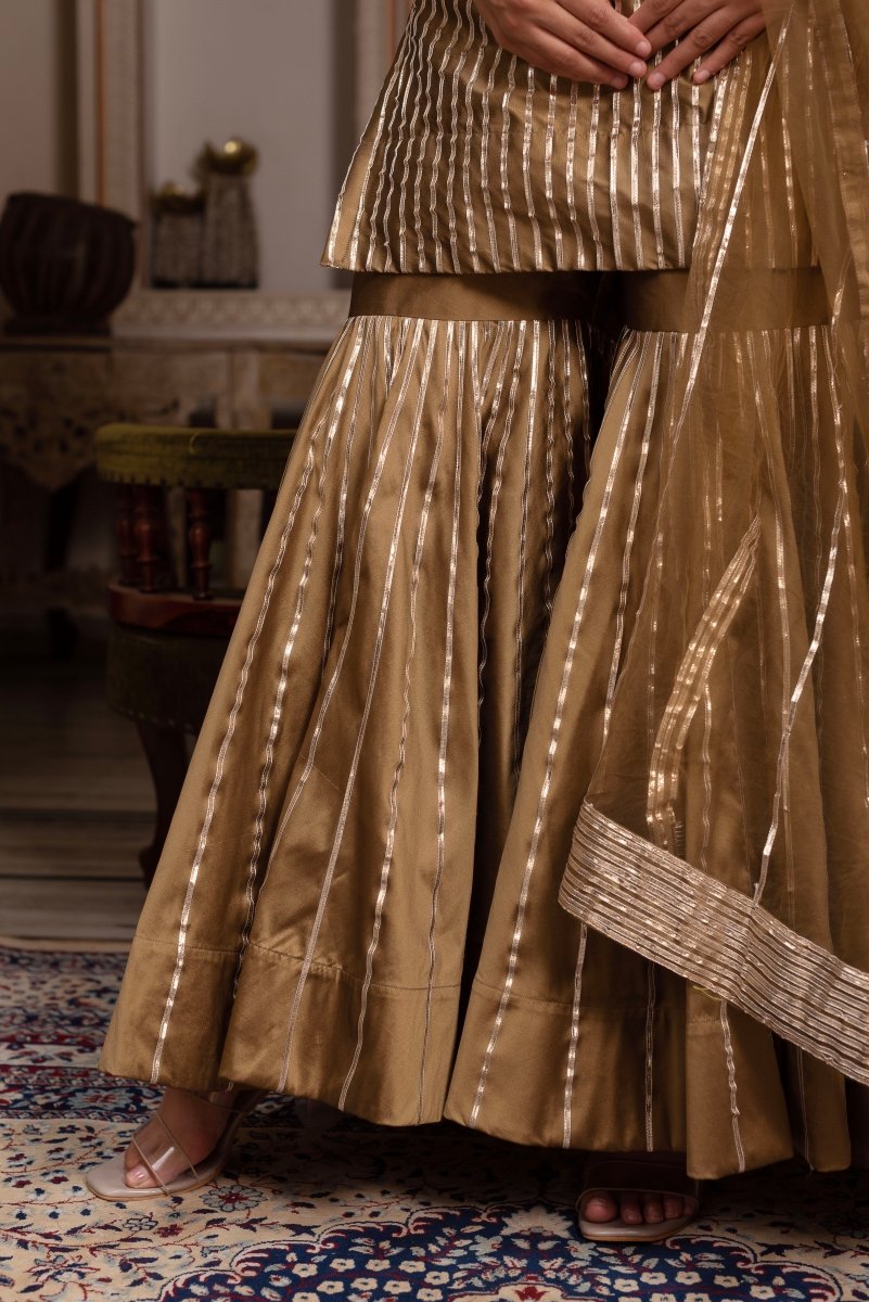 GULABI GALIYAN DUST GOLD TAFFETA SILK GOTA PATTI SHARARA SET WITH SOFT NET DUPATTA - Pomcha Jaipur