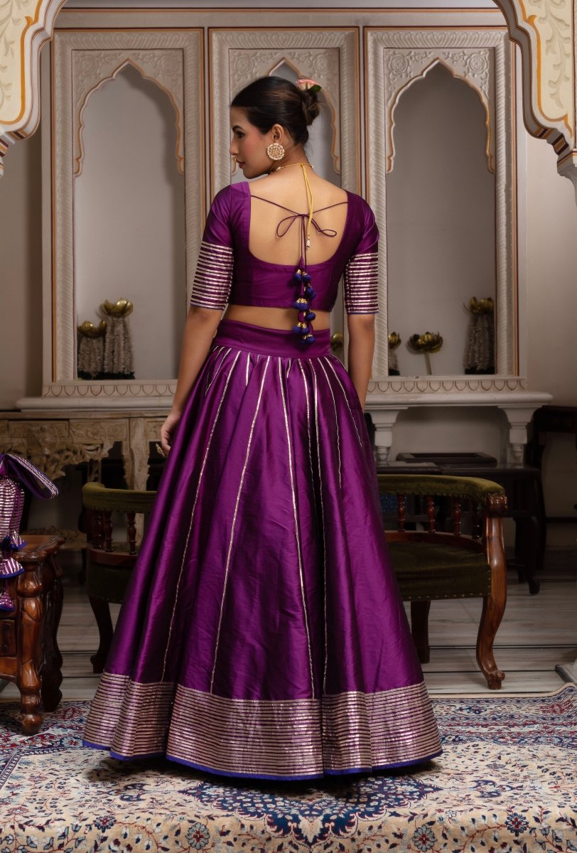 GULABI GALYIAN SEERAT PLUM TAFFETA SILK GOTA PATTI LEHENGA SET WITH SOFT NET DUPATTA - Pomcha Jaipur