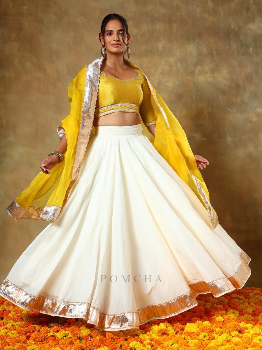 GUZARISH YELLOW OFF WHITE COTTON SILK LEHENGA WITH ORGANZA DUPATTA SET - Pomcha Jaipur
