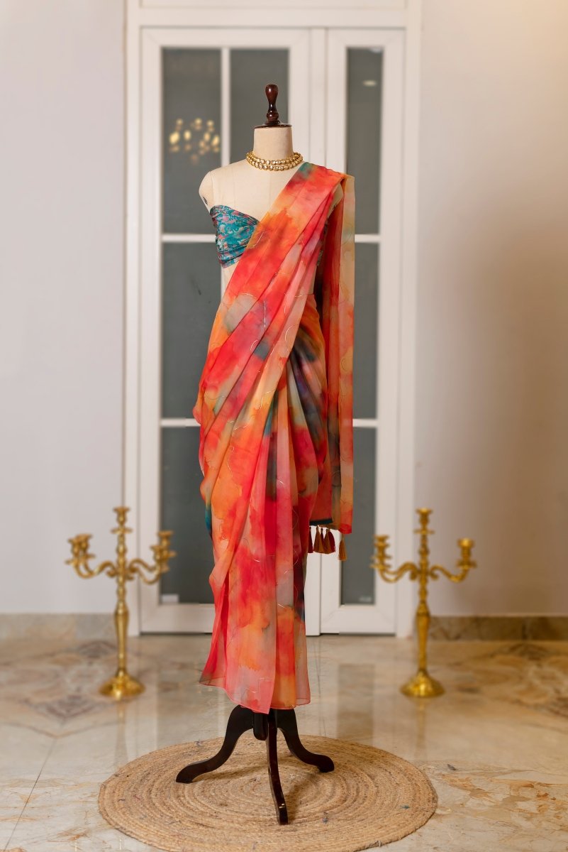SOOT RAAG CRIMSON ORANGE FLAME ORGANZA SAREE WITH BLUE ORGANZA BLOUSE PIECE - Pomcha Jaipur