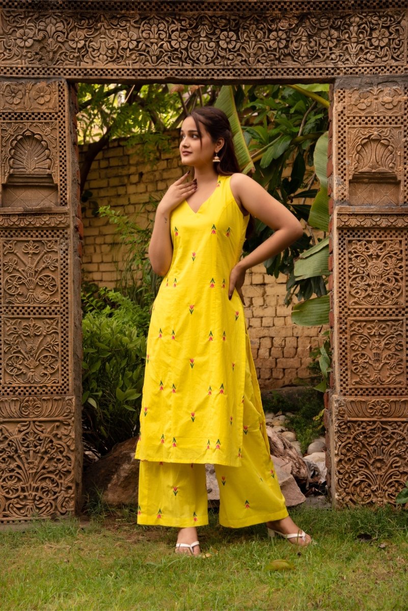 SUNHARI IRA YELLOW COTTON EMBROIDERY SUIT SET WITH EMBROIDED ORGANZA DUPATTA - Pomcha Jaipur