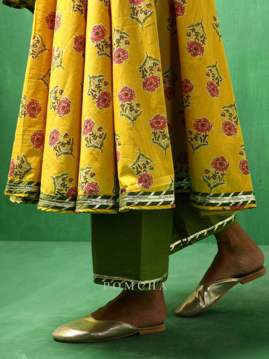ADAA YELLOW HAND BLOCK COTTON ANARKALI SET WITH SOFT NET DUPATTA - Pomcha Jaipur