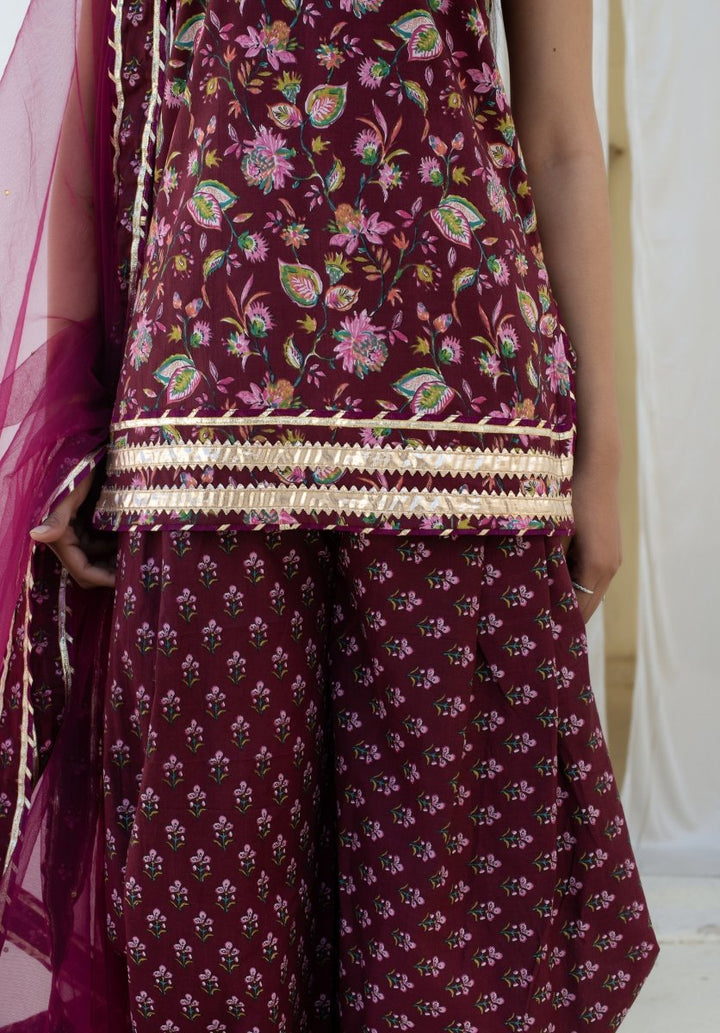 CHHIPA BAZAR WINE COTTON GOTA PATTI KURTA DHOTI SET WITH SOFT NET DUPATTA - Pomcha Jaipur