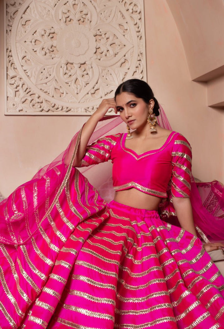 GHAZAL HOT PINK TAFFETA SILK GOTA PATTI LEHENGA SET WITH SOFT NET DUPATTA - Pomcha Jaipur