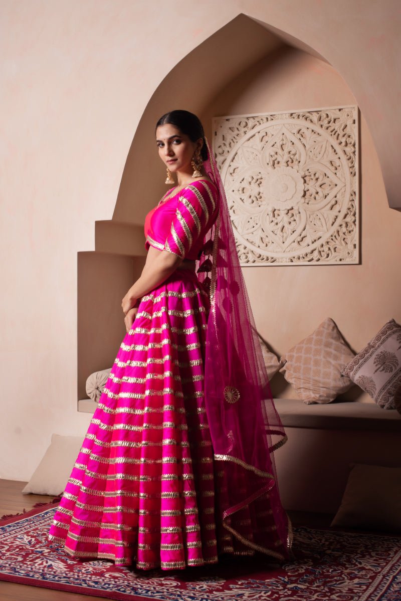 GHAZAL HOT PINK TAFFETA SILK GOTA PATTI LEHENGA SET WITH SOFT NET DUPATTA - Pomcha Jaipur