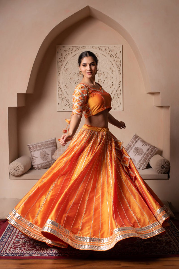 GHAZAL ORANGE TAFFETA SILK GOTA PATTI LEHENGA SET WITH SOFT NET DUPATTA - Pomcha Jaipur