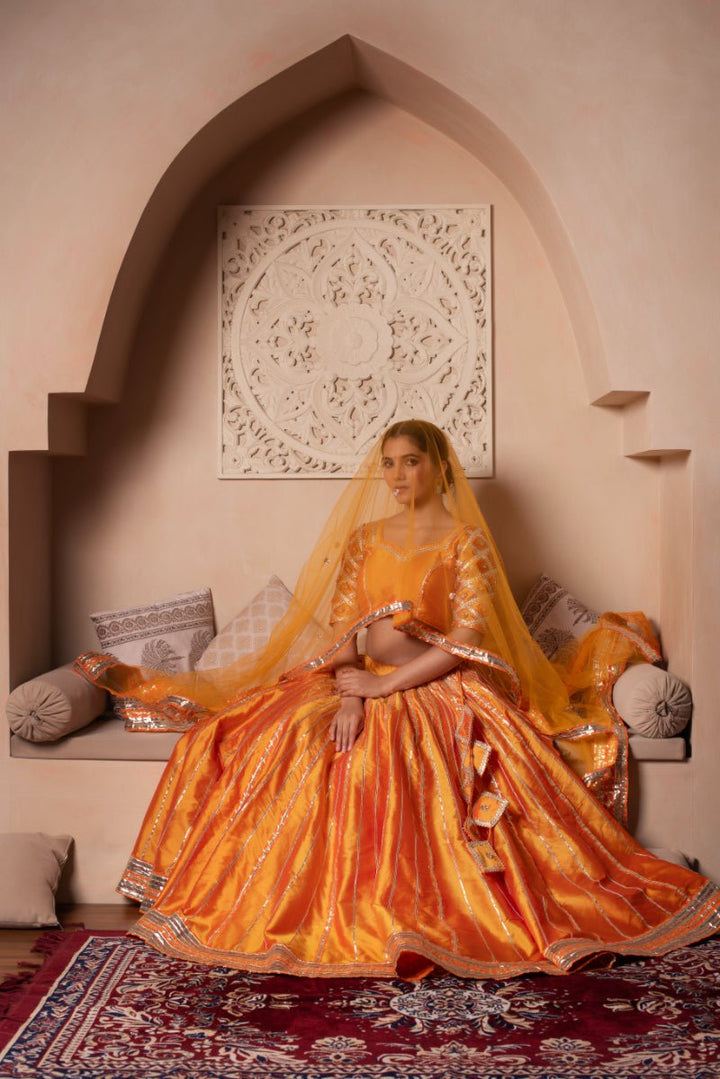 GHAZAL ORANGE TAFFETA SILK GOTA PATTI LEHENGA SET WITH SOFT NET DUPATTA - Pomcha Jaipur
