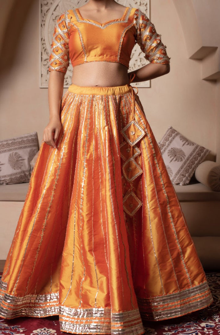 GHAZAL ORANGE TAFFETA SILK GOTA PATTI LEHENGA SET WITH SOFT NET DUPATTA - Pomcha Jaipur