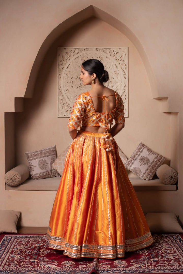GHAZAL ORANGE TAFFETA SILK GOTA PATTI LEHENGA SET WITH SOFT NET DUPATTA - Pomcha Jaipur