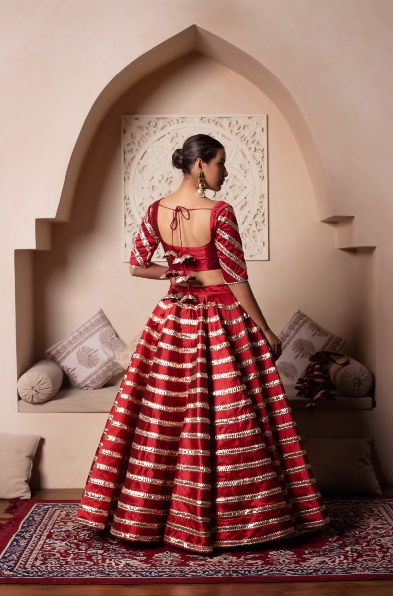 GHAZAL RED TAFFETA SILK GOTA PATTI LEHENGA SET WITH SOFT NET DUPATTA - Pomcha Jaipur