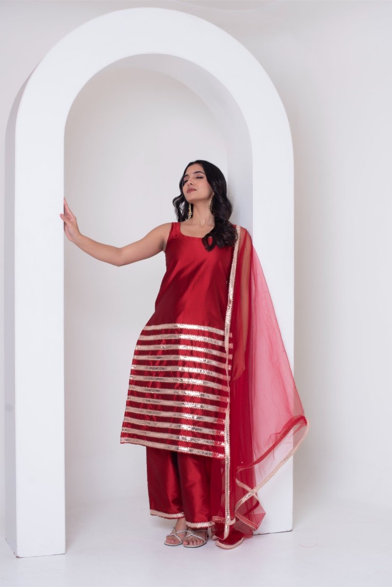 GHAZAL RED TAFFETA SILK GOTA PATTI SUIT SET WITH SOFT NET DUPATTA - Pomcha Jaipur