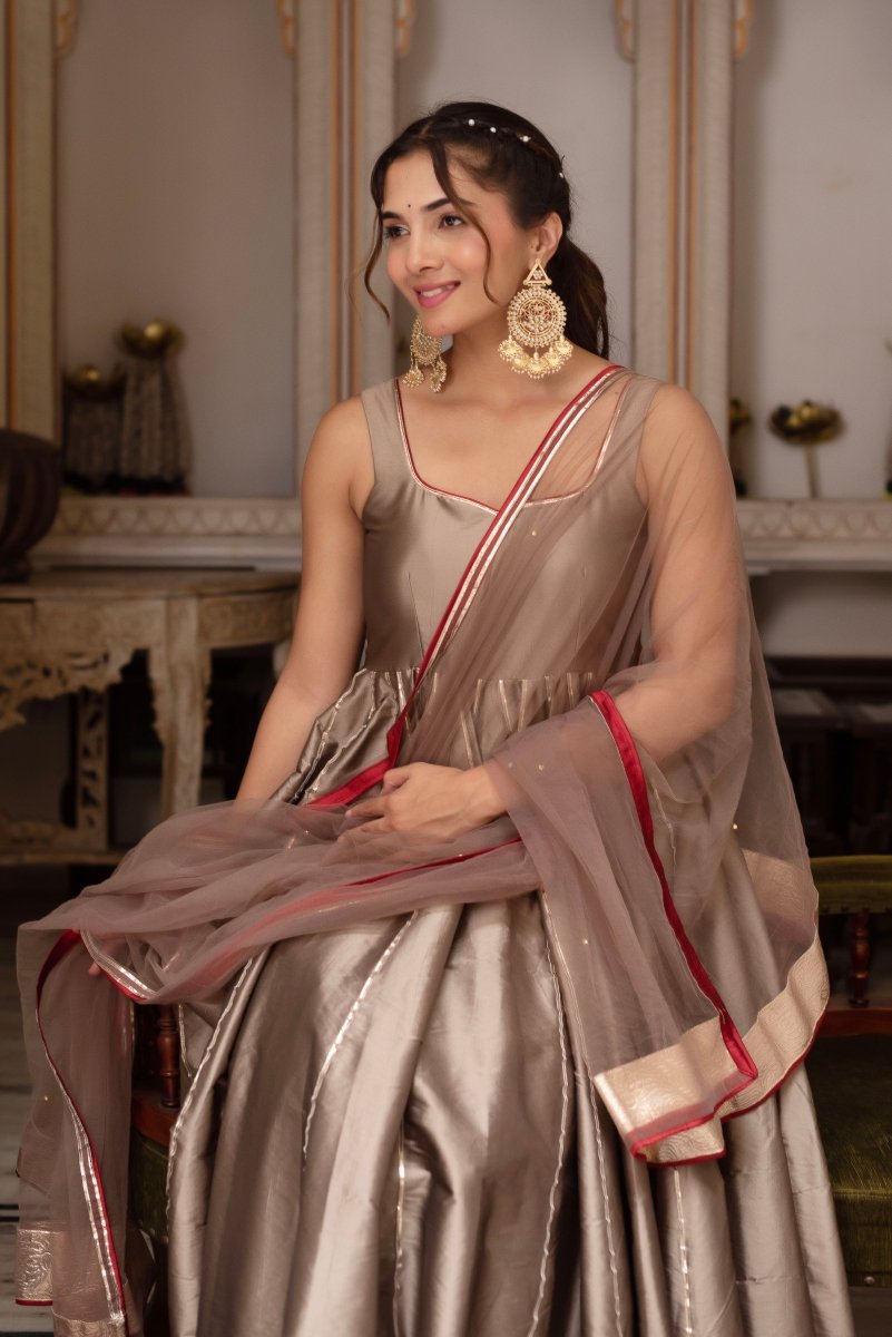 GULABI GALIYAN ASH GOLD TAFFETA GOTA PATTI ANARKALI SET WITH SOFT NET DUPATTA - Pomcha Jaipur
