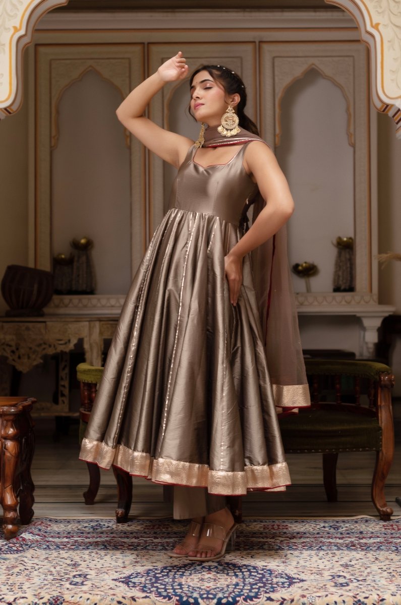 GULABI GALIYAN ASH GOLD TAFFETA GOTA PATTI ANARKALI SET WITH SOFT NET DUPATTA - Pomcha Jaipur