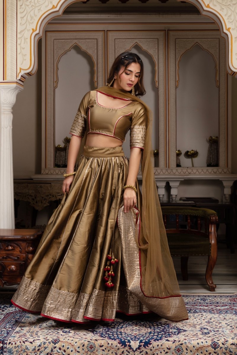 GULABI GALIYAN DUST GOLD TAFFETA SILK GOTA PATTI LEHENGA SET WITH SOFT NET DUPATTA - Pomcha Jaipur