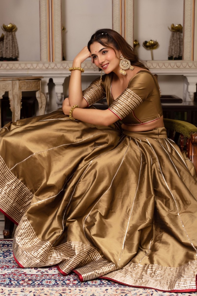 GULABI GALIYAN DUST GOLD TAFFETA SILK GOTA PATTI LEHENGA SET WITH SOFT NET DUPATTA - Pomcha Jaipur