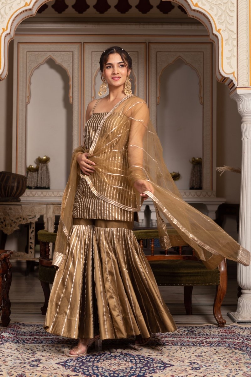 GULABI GALIYAN DUST GOLD TAFFETA SILK GOTA PATTI SHARARA SET WITH SOFT NET DUPATTA - Pomcha Jaipur