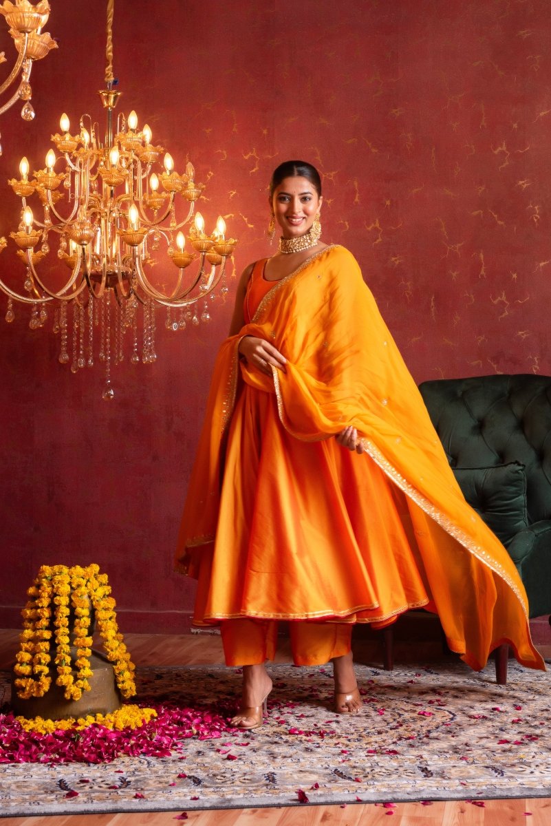GULFIZAN SAFFRON RADIANCE TAFFETA ANARKALI SUIT SET WITH ORGANZA AARI TAARI WORK DUPATTA - Pomcha Jaipur