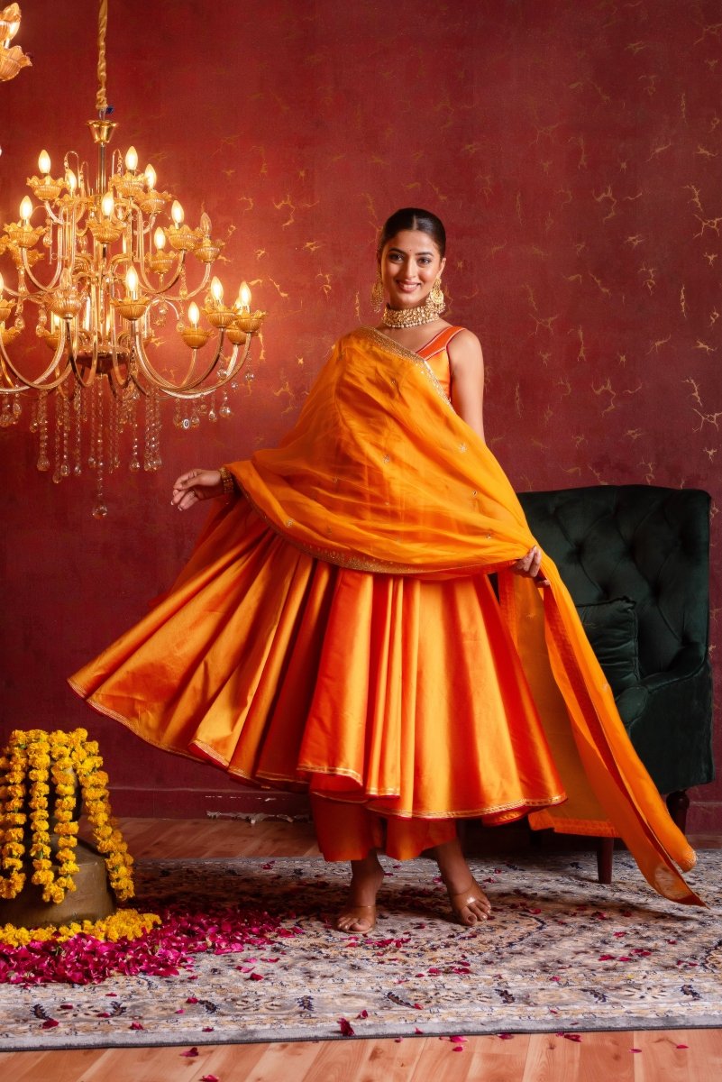 GULFIZAN SAFFRON RADIANCE TAFFETA ANARKALI SUIT SET WITH ORGANZA AARI TAARI WORK DUPATTA - Pomcha Jaipur