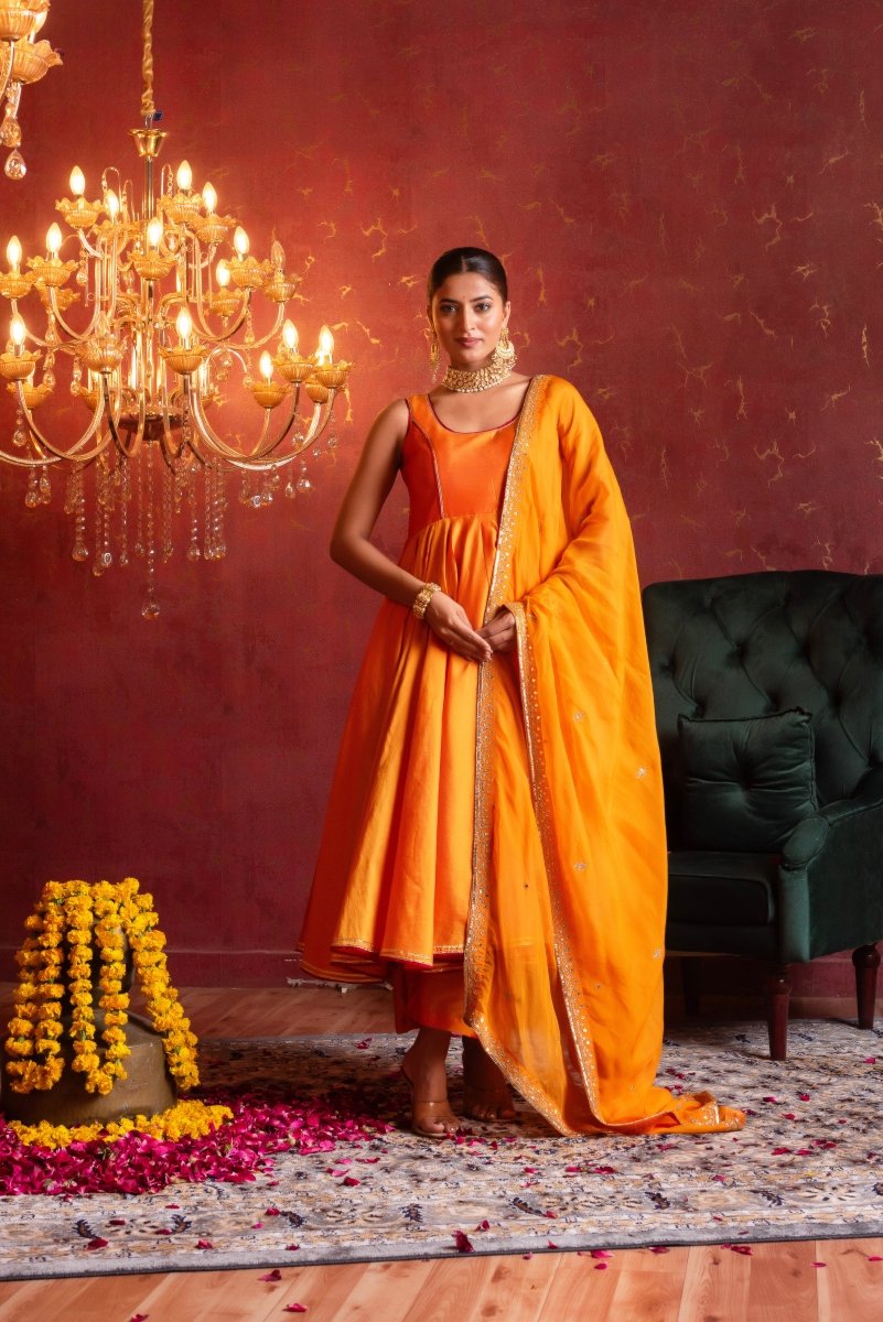 GULFIZAN SAFFRON RADIANCE TAFFETA ANARKALI SUIT SET WITH ORGANZA AARI TAARI WORK DUPATTA - Pomcha Jaipur