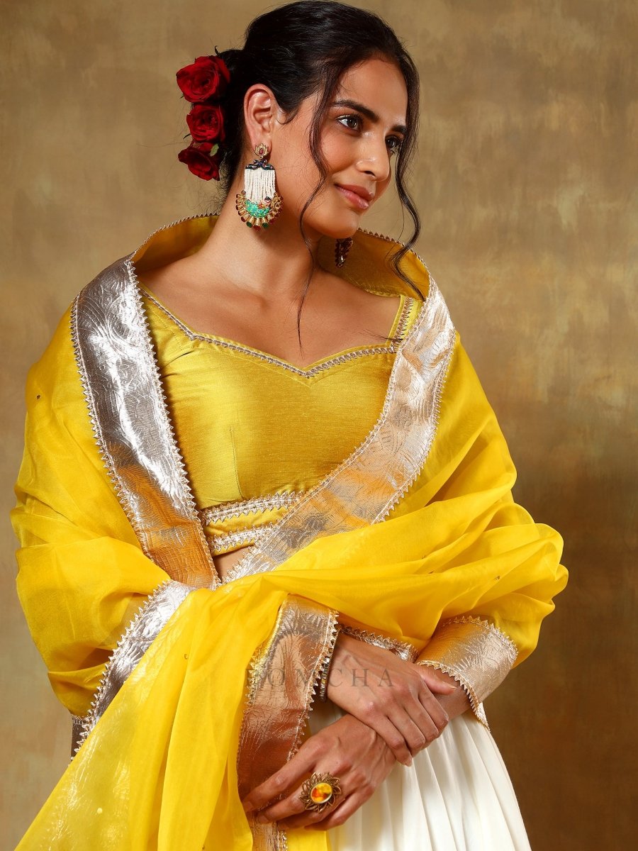 GUZARISH YELLOW OFF WHITE COTTON SILK LEHENGA WITH ORGANZA DUPATTA SET - Pomcha Jaipur
