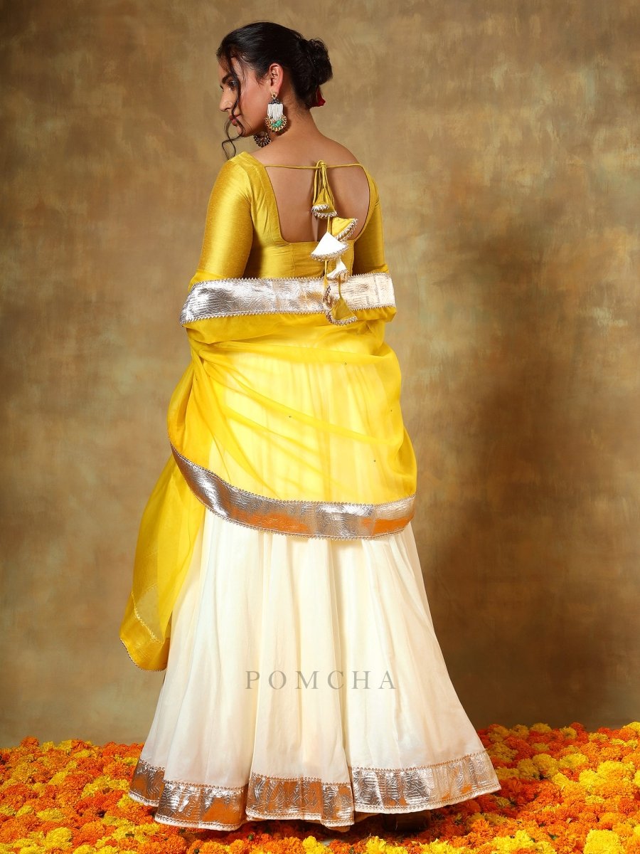 GUZARISH YELLOW OFF WHITE COTTON SILK LEHENGA WITH ORGANZA DUPATTA SET - Pomcha Jaipur