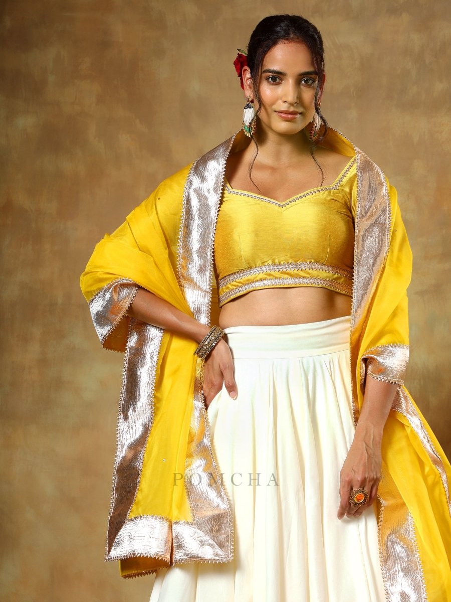 GUZARISH YELLOW OFF WHITE COTTON SILK LEHENGA WITH ORGANZA DUPATTA SET - Pomcha Jaipur
