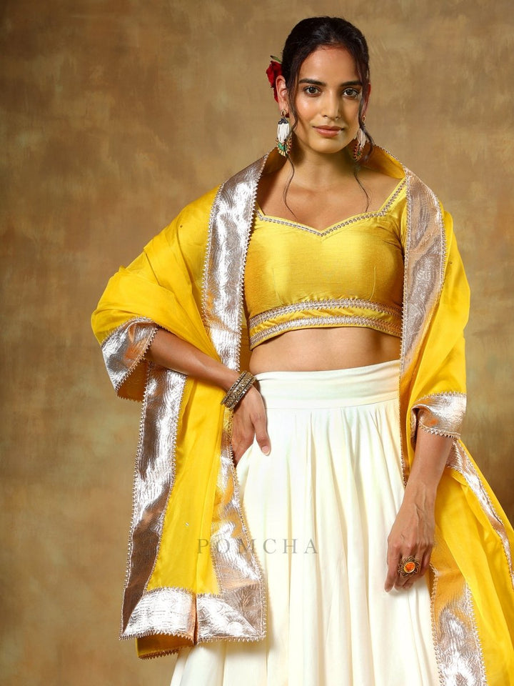 GUZARISH YELLOW OFF WHITE COTTON SILK LEHENGA WITH ORGANZA DUPATTA SET - Pomcha Jaipur