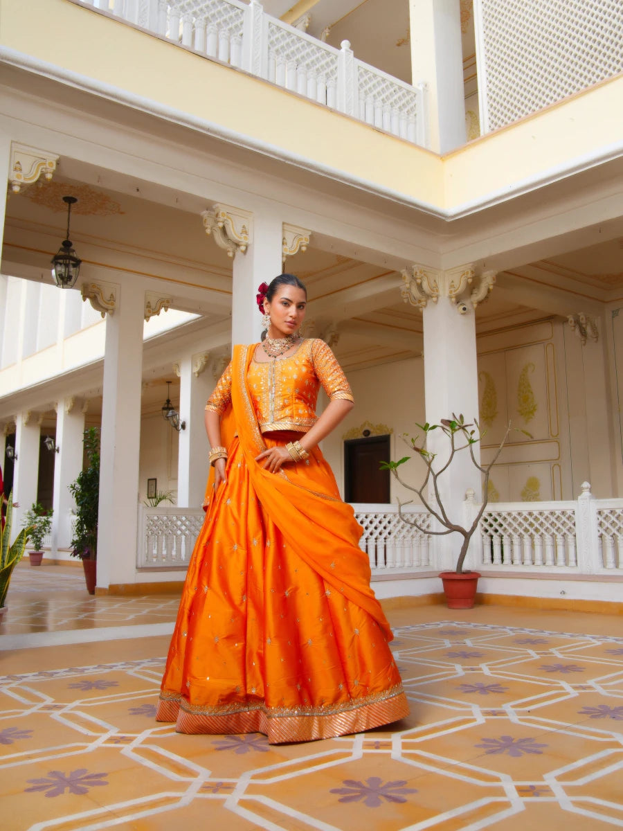 MEHFIL KESARI SITARA AARI TAARI HAND WORK TAFFETA LEHENGA SET WITH ORGANZA DUPATTA - Pomcha Jaipur