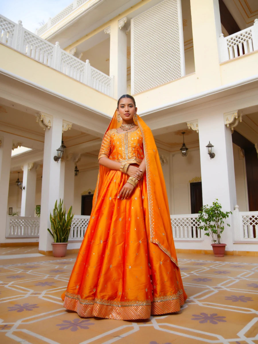 MEHFIL KESARI SITARA AARI TAARI HAND WORK TAFFETA LEHENGA SET WITH ORGANZA DUPATTA - Pomcha Jaipur