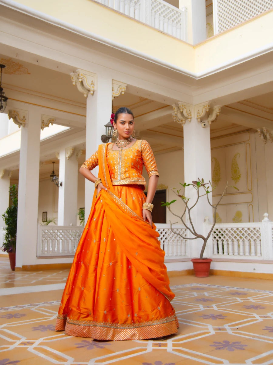 MEHFIL KESARI SITARA AARI TAARI HAND WORK TAFFETA LEHENGA SET WITH ORGANZA DUPATTA - Pomcha Jaipur