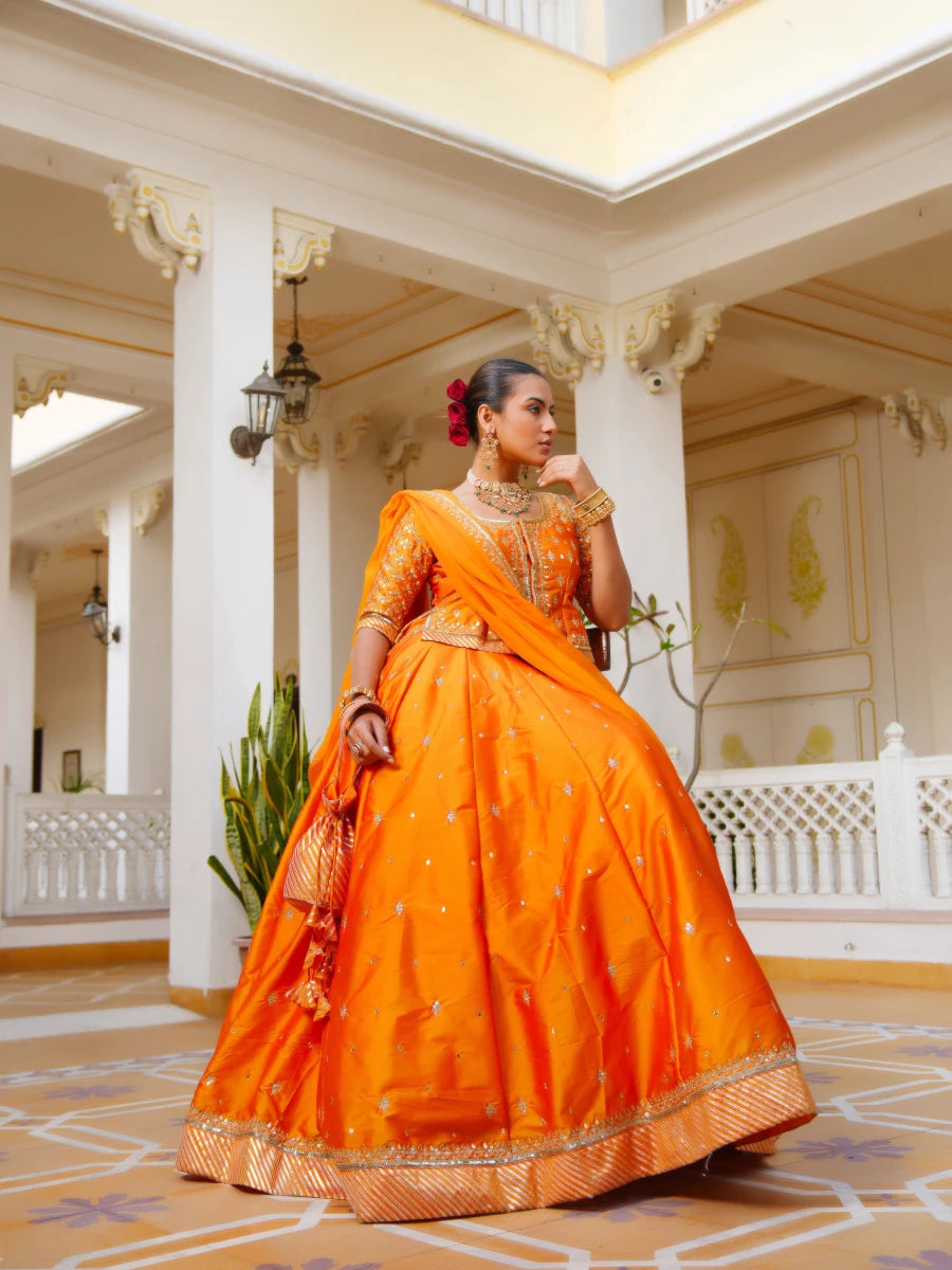 MEHFIL KESARI SITARA AARI TAARI HAND WORK TAFFETA LEHENGA SET WITH ORGANZA DUPATTA - Pomcha Jaipur