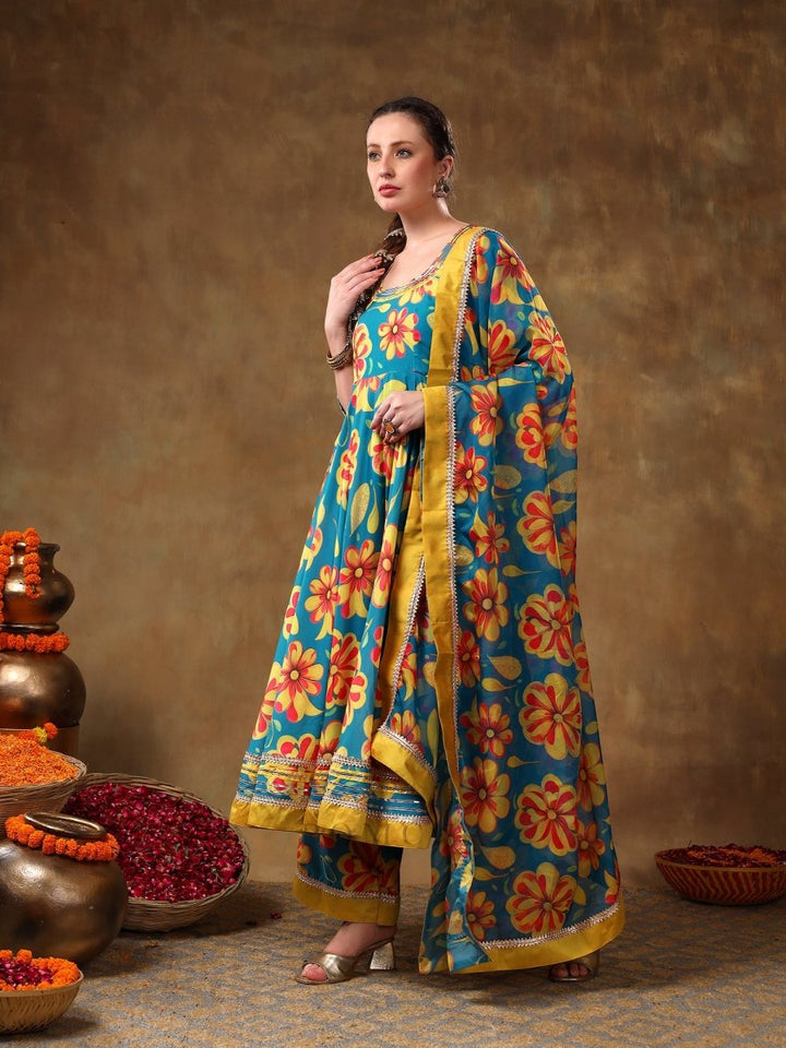 MERAKI YELLOW FLOWER BLUE MUSLIN ANARKALI SET WITH ORGANZA DUPATTA - Pomcha Jaipur