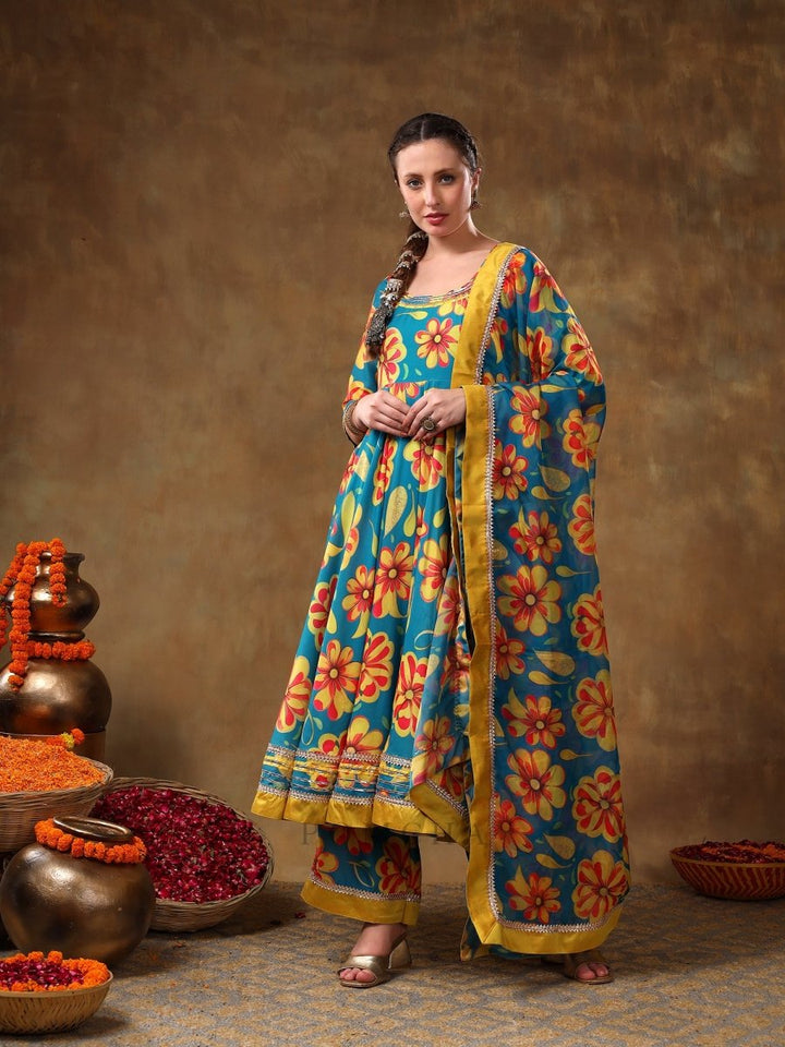 MERAKI YELLOW FLOWER BLUE MUSLIN ANARKALI SET WITH ORGANZA DUPATTA - Pomcha Jaipur
