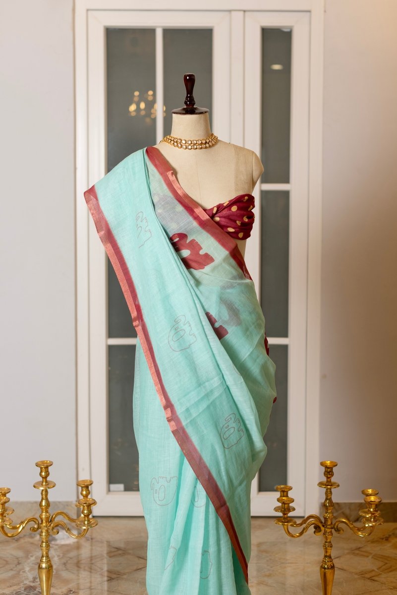 SOOT RAAG MINT GREEN BOLD MOTIFS LINEN SAREE WITH BLOUSE PIECE - Pomcha Jaipur