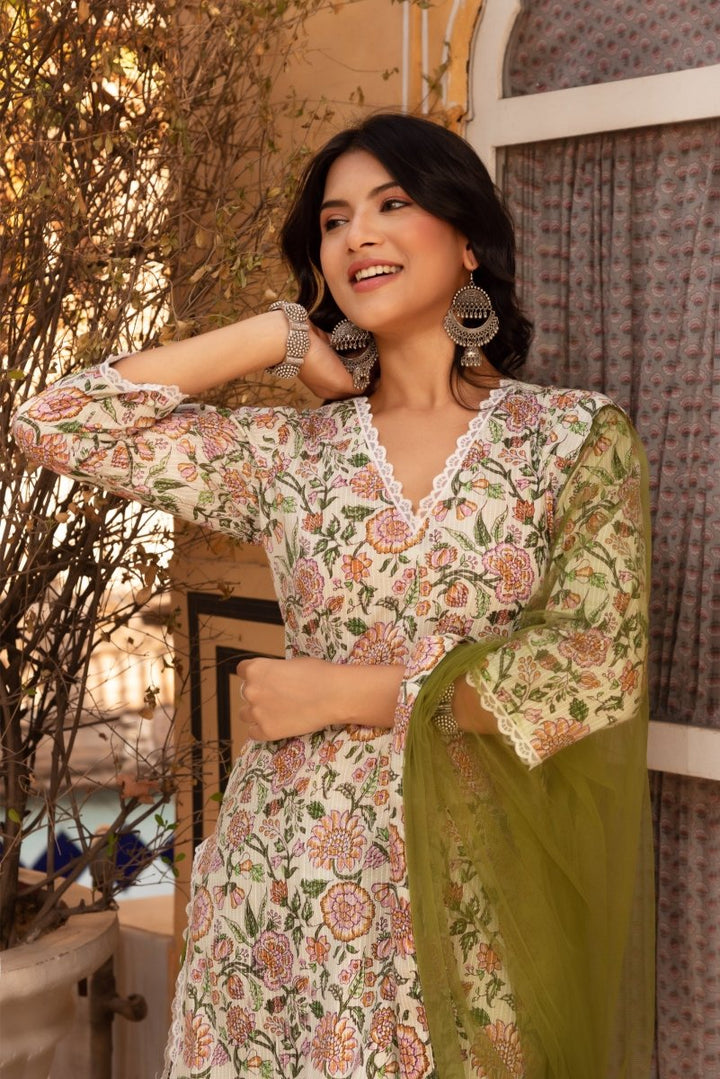 SUNHARI GREEN FLORAL PRINT COTTON SUIT SET WITH SOFT NET DUPATTA - Pomcha Jaipur