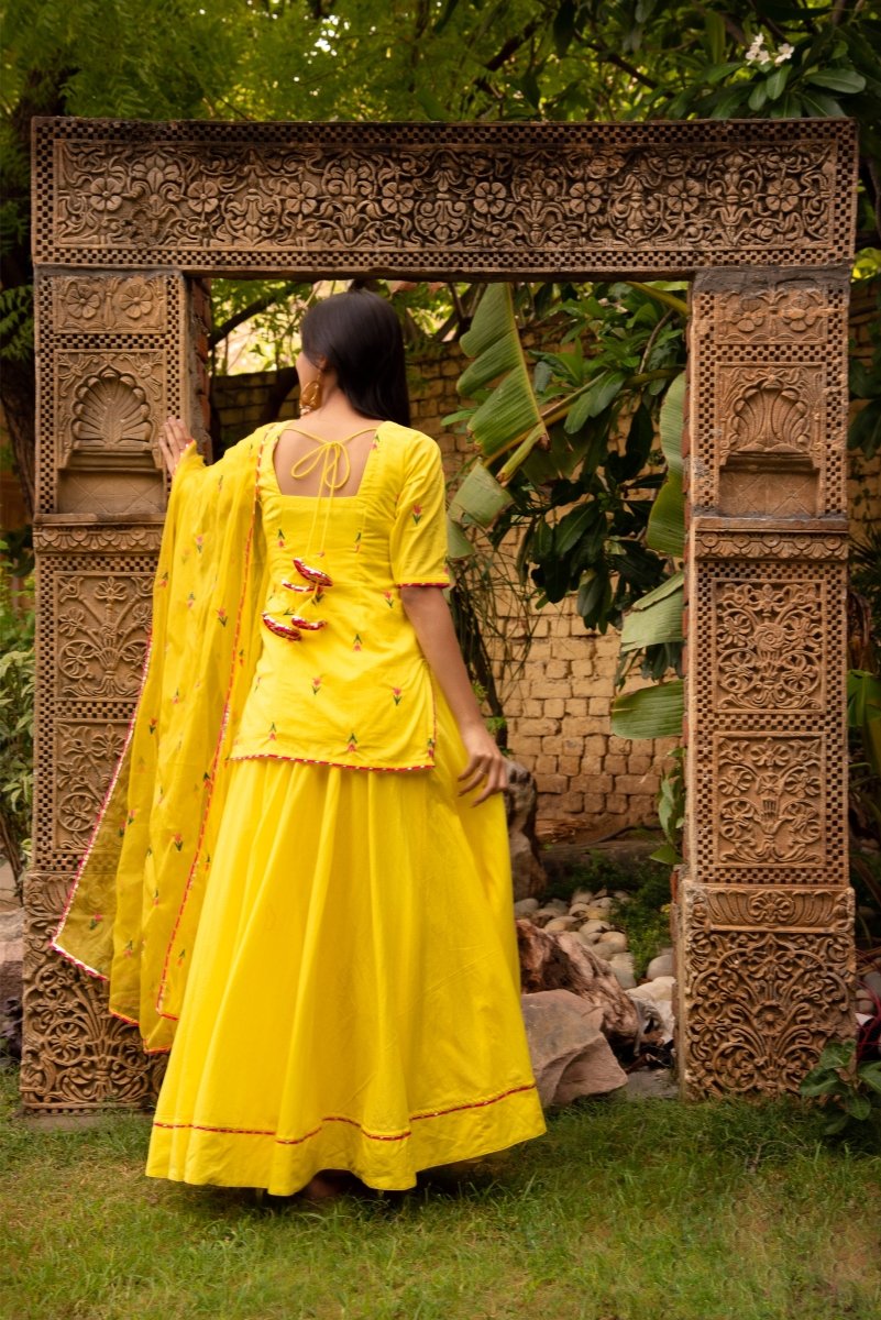 SUNHARI IRA YELLOW COTTON EMBROIDERY SKIRT SET WITH EMBROIDERED ORGANZA DUPATTA - Pomcha Jaipur