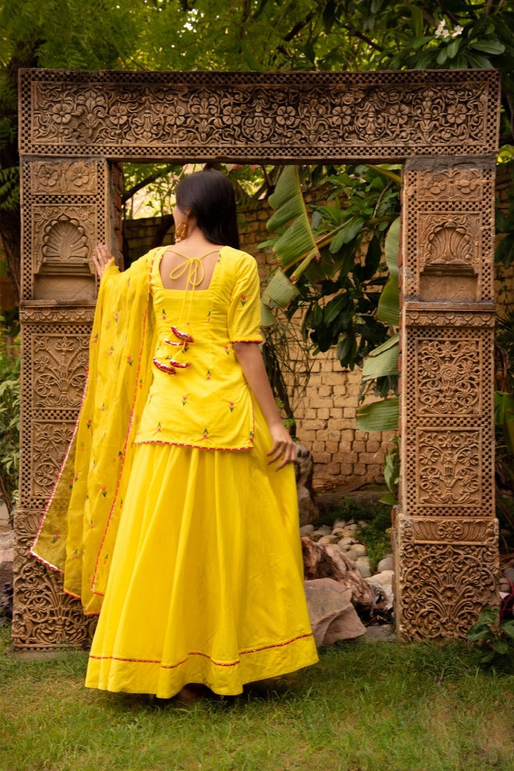 SUNHARI IRA YELLOW COTTON EMBROIDERY SKIRT SET WITH EMBROIDERED ORGANZA DUPATTA - Pomcha Jaipur