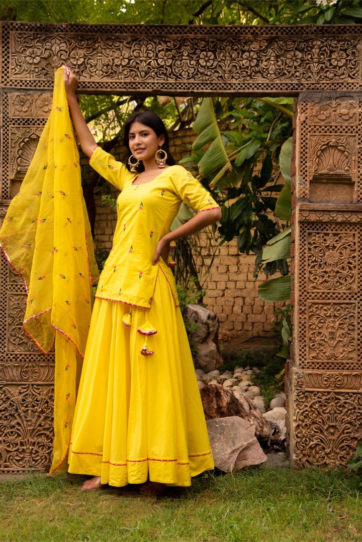 SUNHARI IRA YELLOW COTTON EMBROIDERY SKIRT SET WITH EMBROIDERED ORGANZA DUPATTA - Pomcha Jaipur