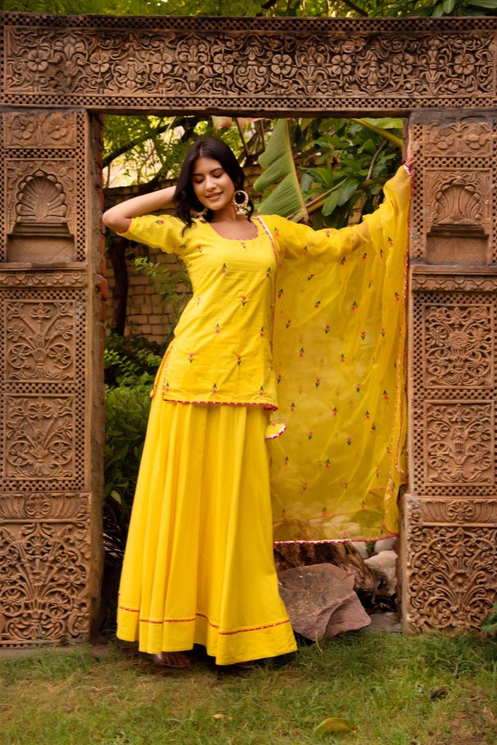 SUNHARI IRA YELLOW COTTON EMBROIDERY SKIRT SET WITH EMBROIDERED ORGANZA DUPATTA - Pomcha Jaipur