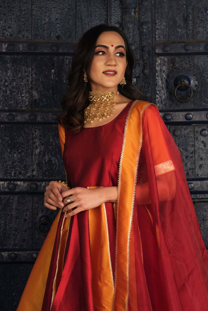 DOUBLE SHADE ORANGE AND MAROON TAFFETA SILK ANARKALI WITH ORGANZA DUPATTA SET - Pomcha Jaipur